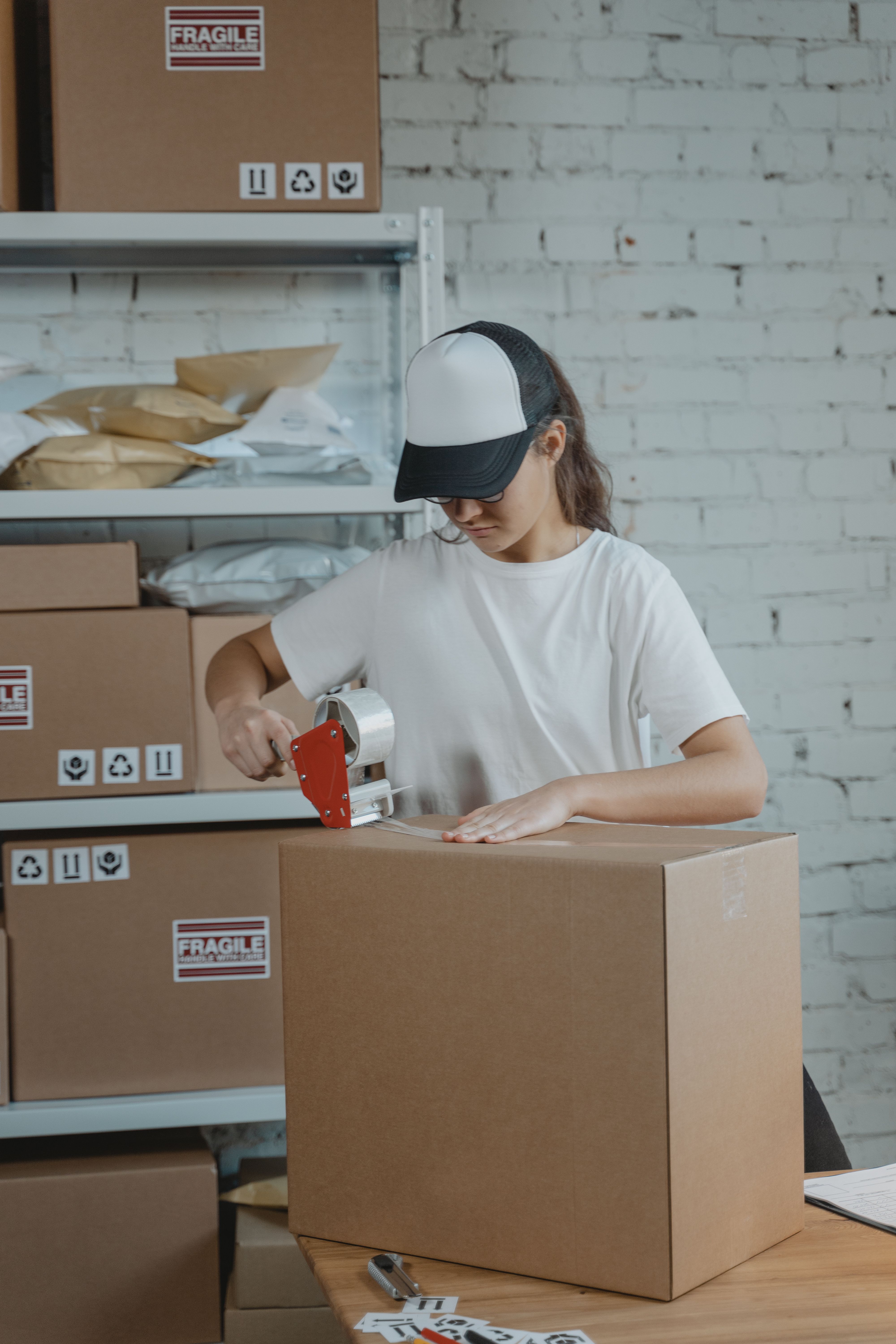 Illustrative photograph of a parcel being packed